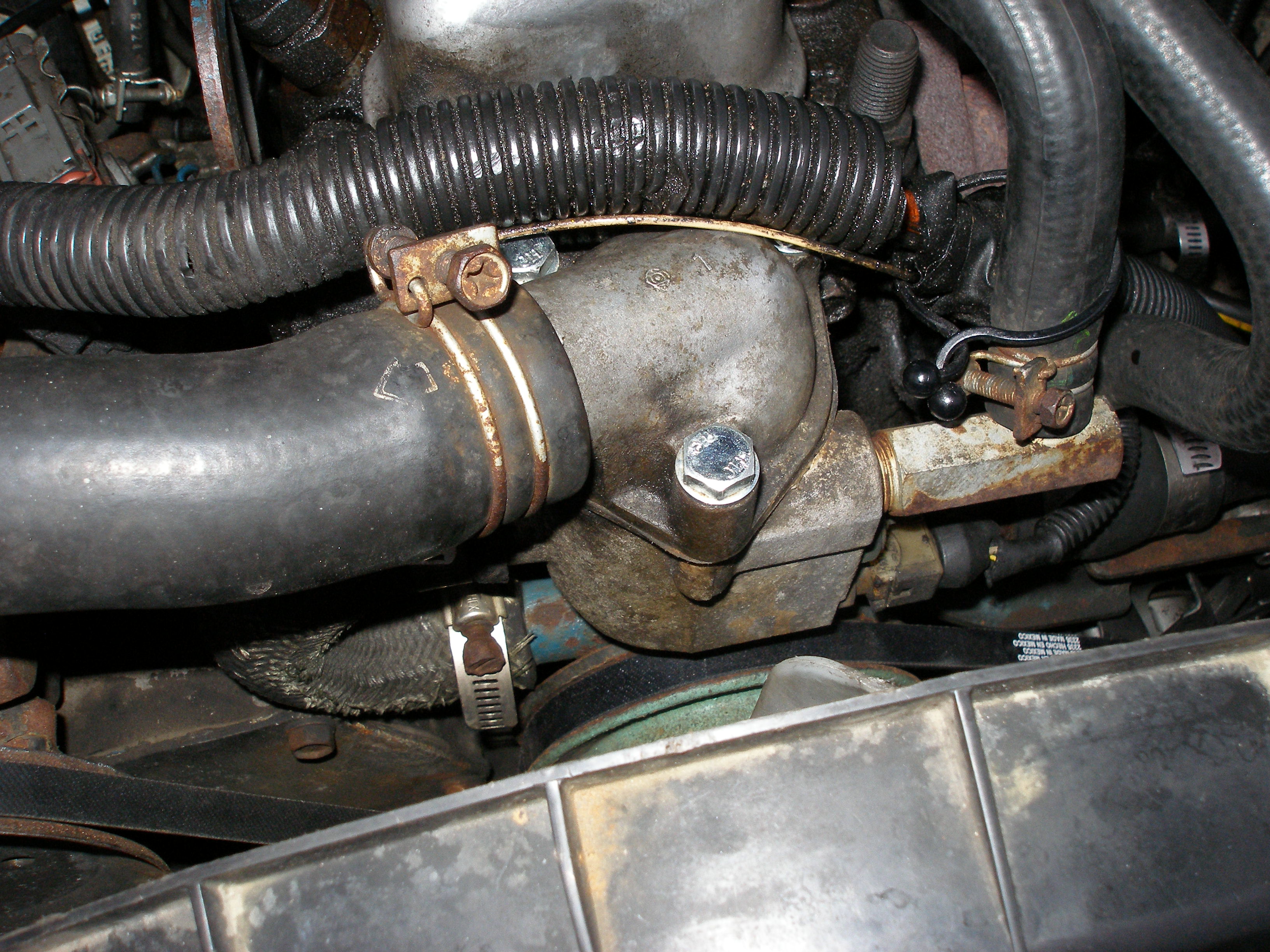 replace coolant thermostat on 2006 nissan sentra