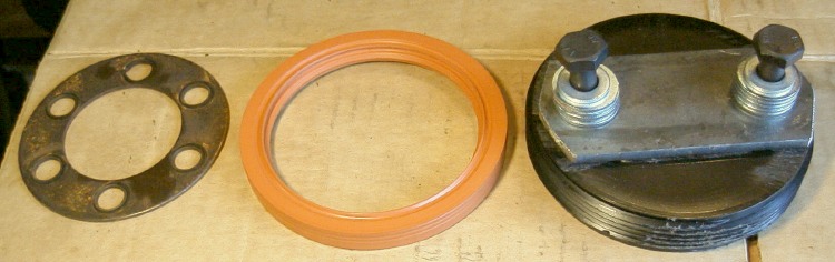 The guide ring, the new seal, and the assembled tool